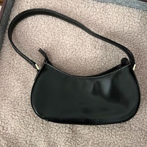 Liz Claiborne small purse.  Super stylish.  Dresses up any outfit.
